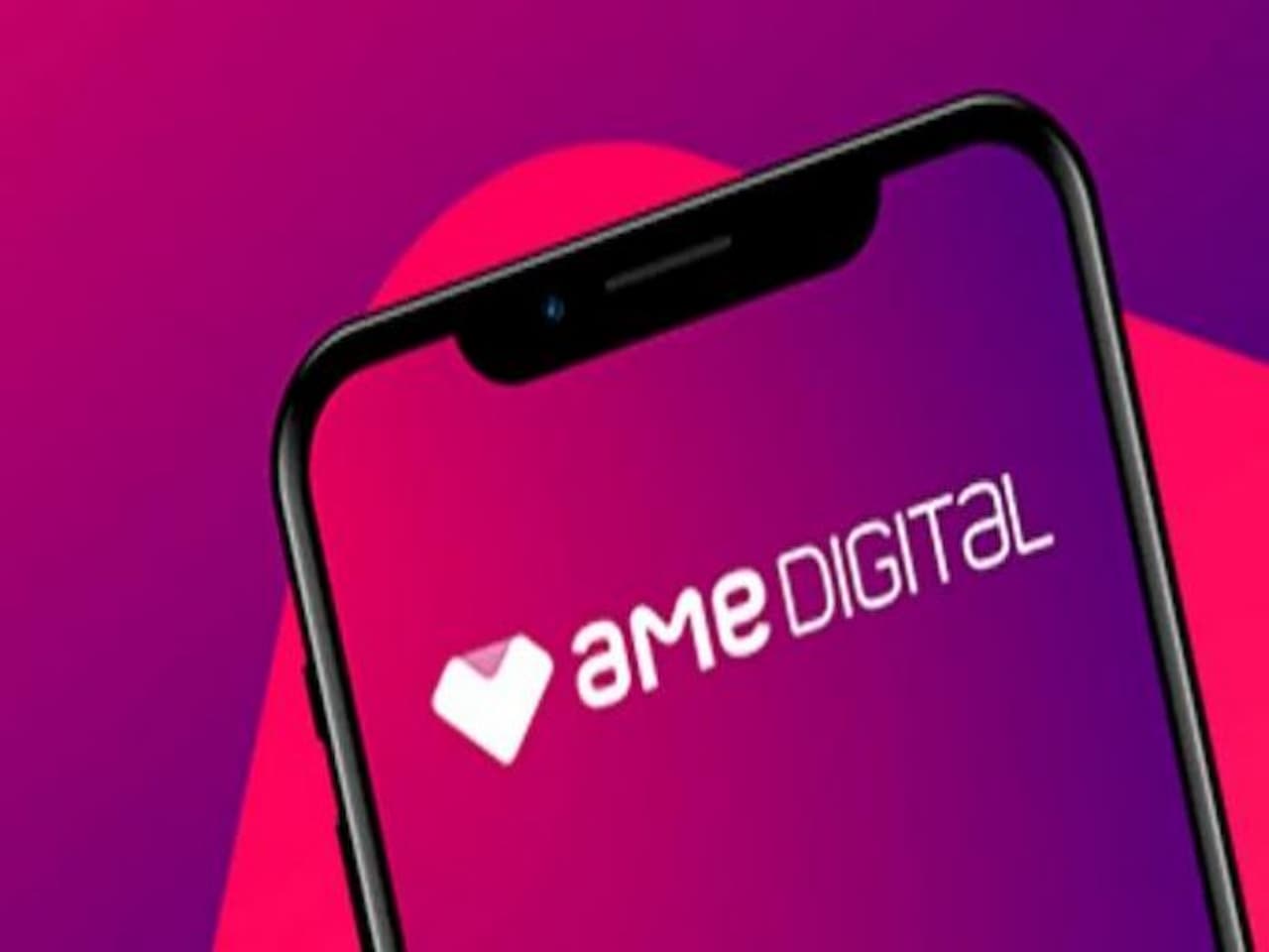 celular com tela no Ame Digital representando empréstimos para negativados